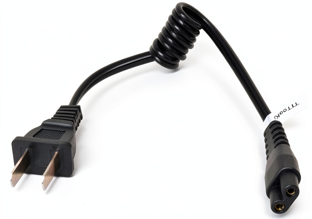 TiToeKi stun gun charging cord expanded to full length on a table